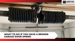A close up view of a broken garage door torsion spring showing a visible gap where the metal coil has snapped under tension