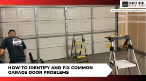 A technician repairing a sectional garage door next to ladders and tools